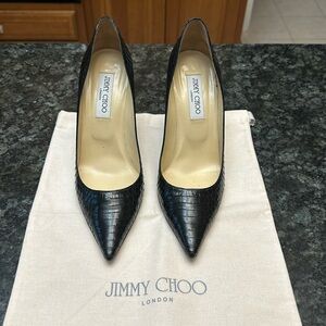 Jimmy Choo pump in black panelled elaphe. Great condition. Size 39
